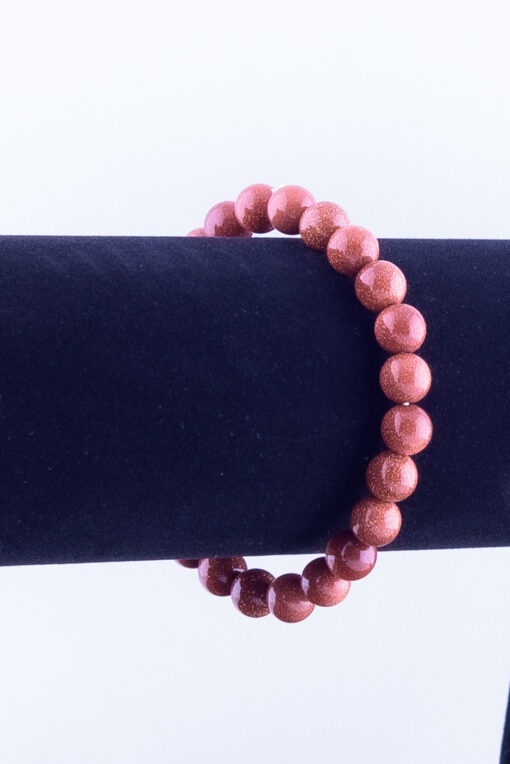 Kralen armband bruin met gouden glans